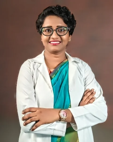 Dr Sheela M